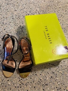 Ted Baker London Black Patent Ankle-Strap Heeled Sandals with Gold Toe Plate